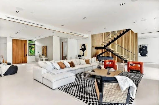 A luxury sofa makes a statement furniture piece in a formal living room.